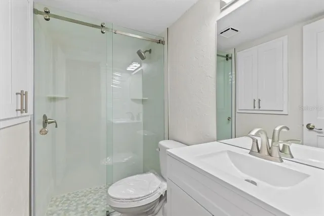 a view of entryway with wooden floor and stairs