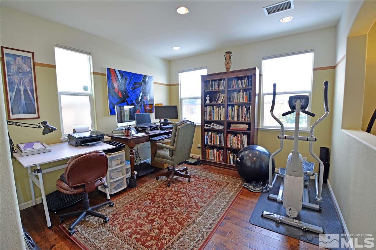 445 Manciano Way Reno, NV 89521 - Photo 4 of 28 a view of a workspace with furniture and a window
