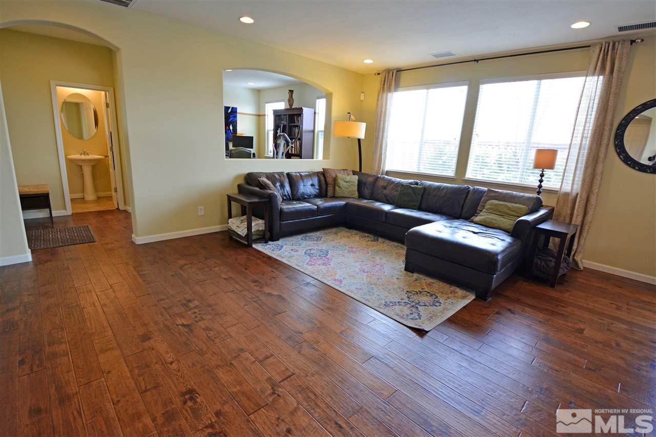 445 Manciano Way Reno, NV 89521 - Photo 9 of 28 a living room with furniture and a large window