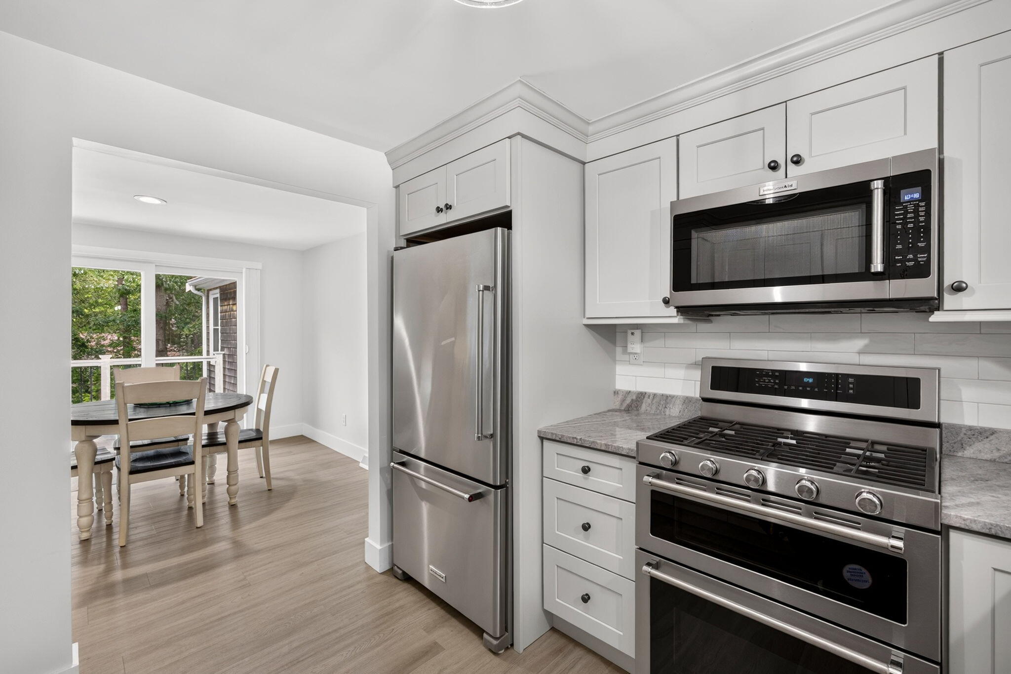 35 Debs Hill Road, Unit 35 Yarmouth Port, MA 02675 - Photo 7 of 36 a kitchen with a stove microwave and refrigerator