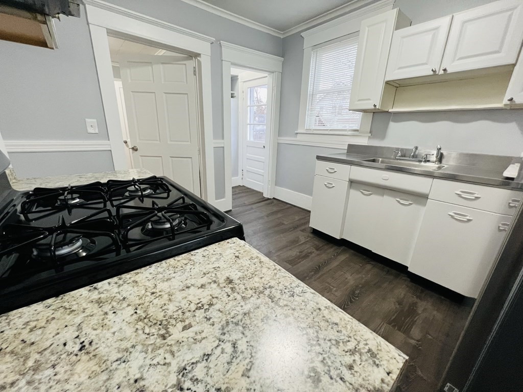 781 White Street Springfield, MA 01108 - Photo 12 of 25 a kitchen with sink and cabinets