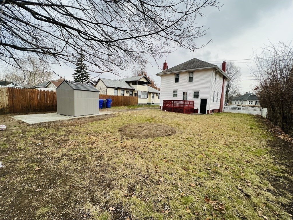 781 White Street Springfield, MA 01108 - Photo 21 of 25 a view of a house with a yard and tree