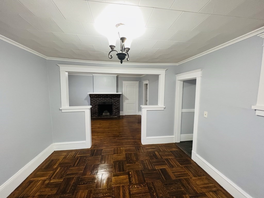 781 White Street Springfield, MA 01108 - Photo 6 of 25 a view of livingroom with hardwood floor and kitchen view