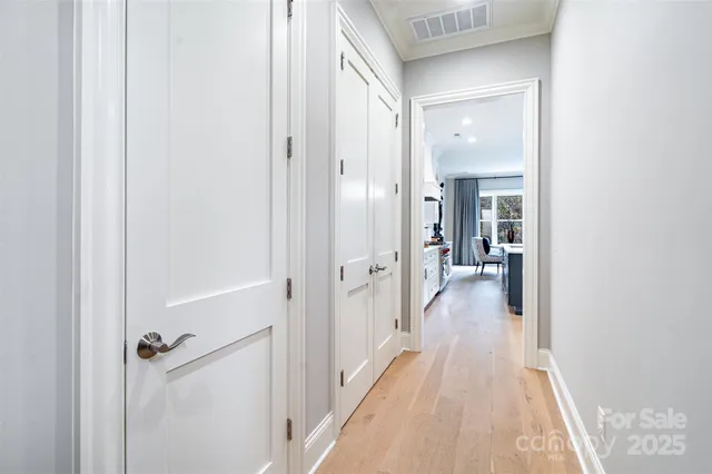 a view of a bathroom from a hallway
