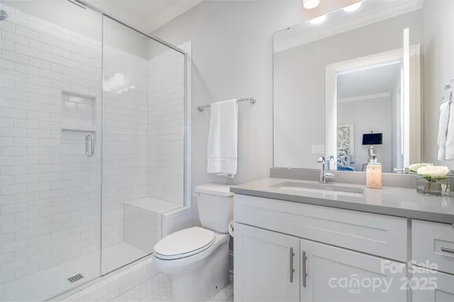 a room with a walk in closet and a window