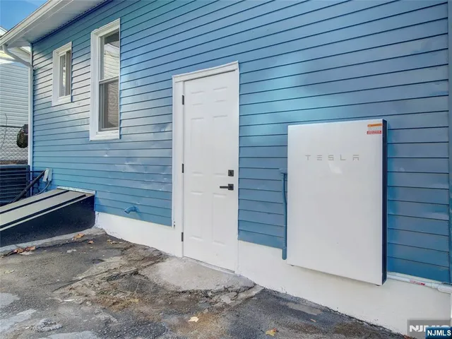 a view of a back yard of the house