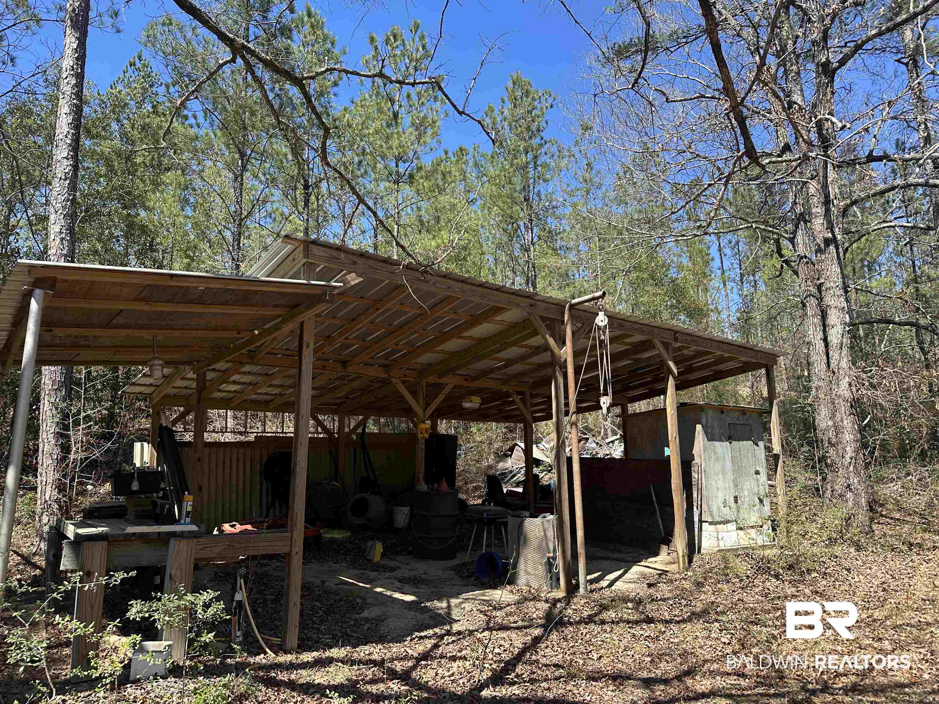 8557 County Road 34 Millry, AL 36558 - Photo 36 of 36 View of outbuilding featuring a carport