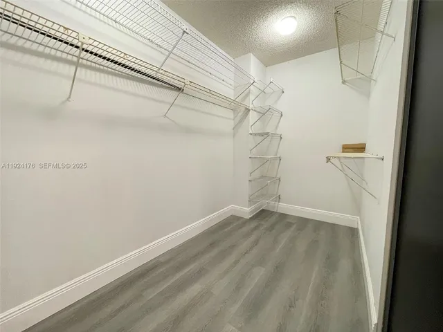 a view of a room with racks on the wall