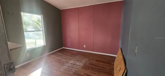 an empty room with windows