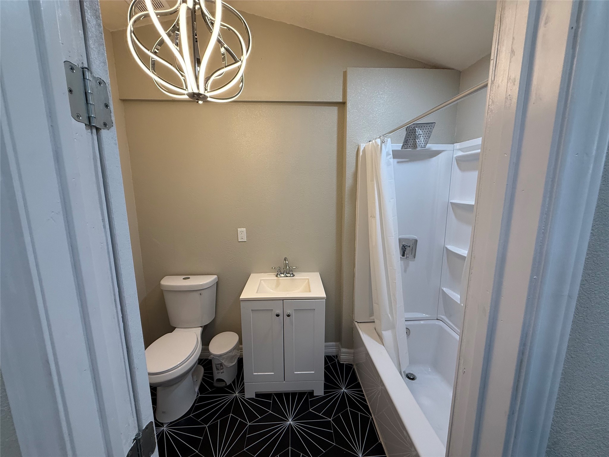 3310 Vega Houston, TX 77088 - Photo 6 of 8 a bathroom with a toilet and a shower