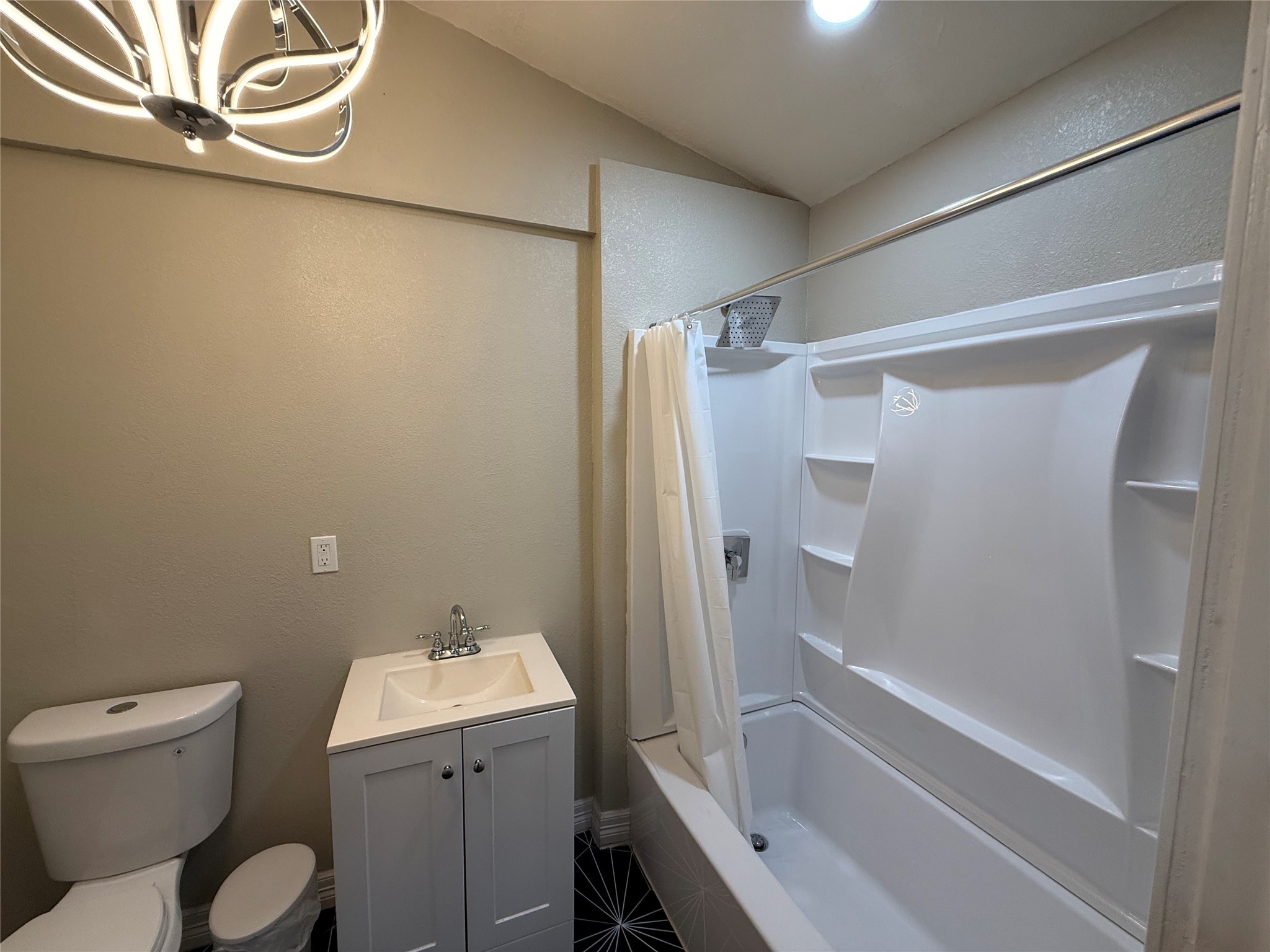 3310 Vega Houston, TX 77088 - Photo 7 of 8 a bathroom with a sink toilet and shower