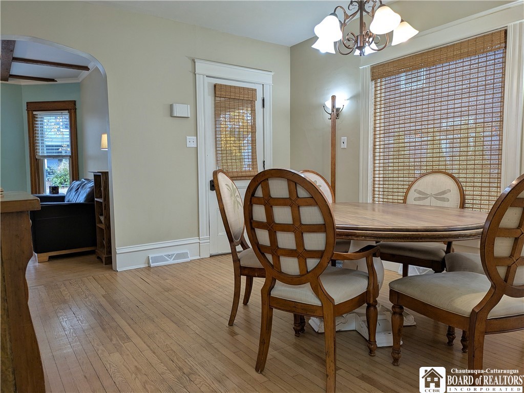 33 Maple Street Ellery, NY 14712 - Photo 7 of 40 Dining room with oak flooring and detailed trim wo