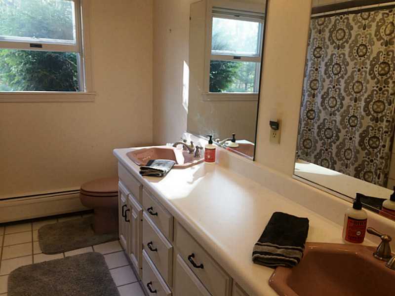 141 Franklin Road Scituate, RI 02825 - Photo 14 of 25 Bathroom. One of the three full baths in this home. Double sinks come in handy!