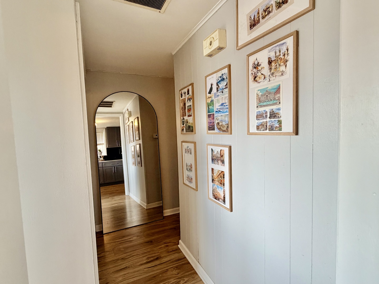 7238 West Crain Street, Unit G Niles, IL 60714 - Photo 7 of 11 a view of a hallway with wooden floor and a window
