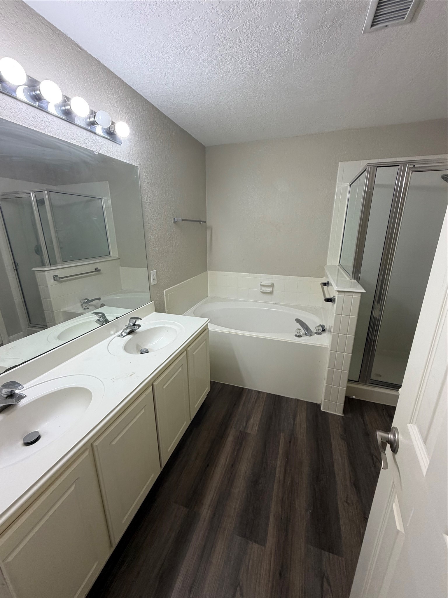 3219 Watercliff Court Spring, TX 77388 - Photo 16 of 21 a bathroom with a sink a large mirror and a toilet