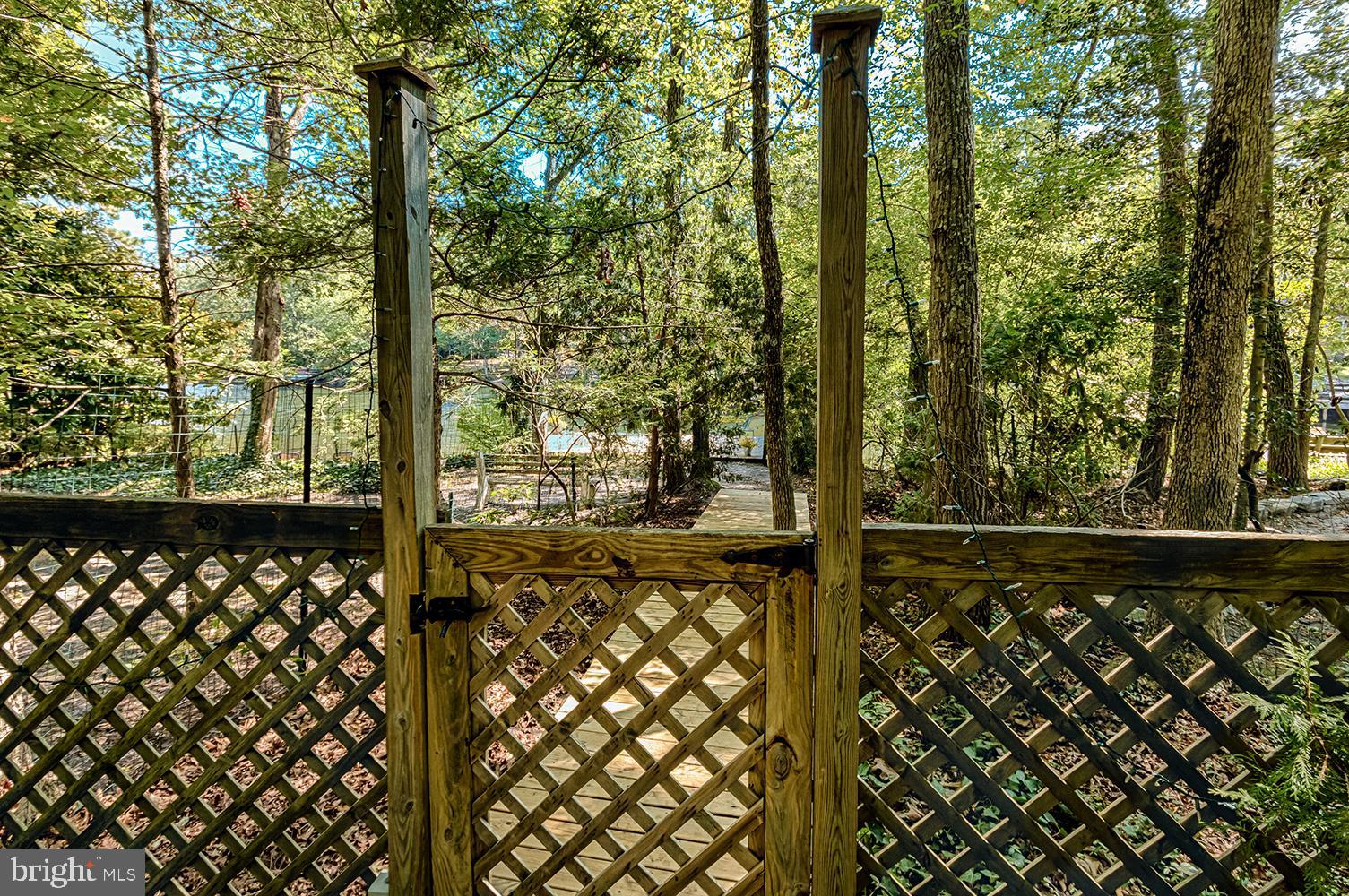 205 Migazee Trail Medford Lakes, NJ 08055 - Photo 32 of 38 Fenced yard entry to the lake