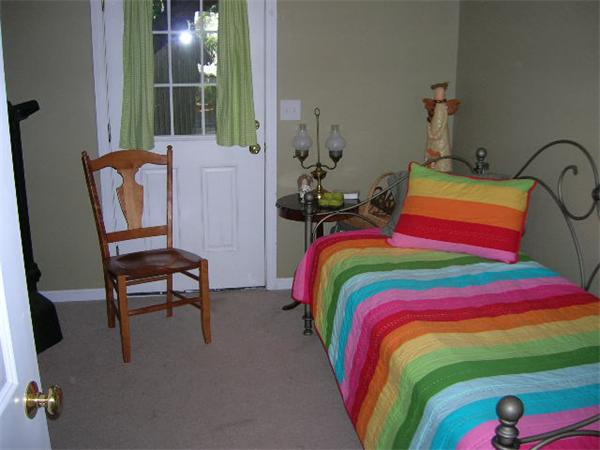 262 Littleton Road, Unit 3 Chelmsford, MA 01824 - Photo 11 of 14 a bedroom with a bed chair and a window