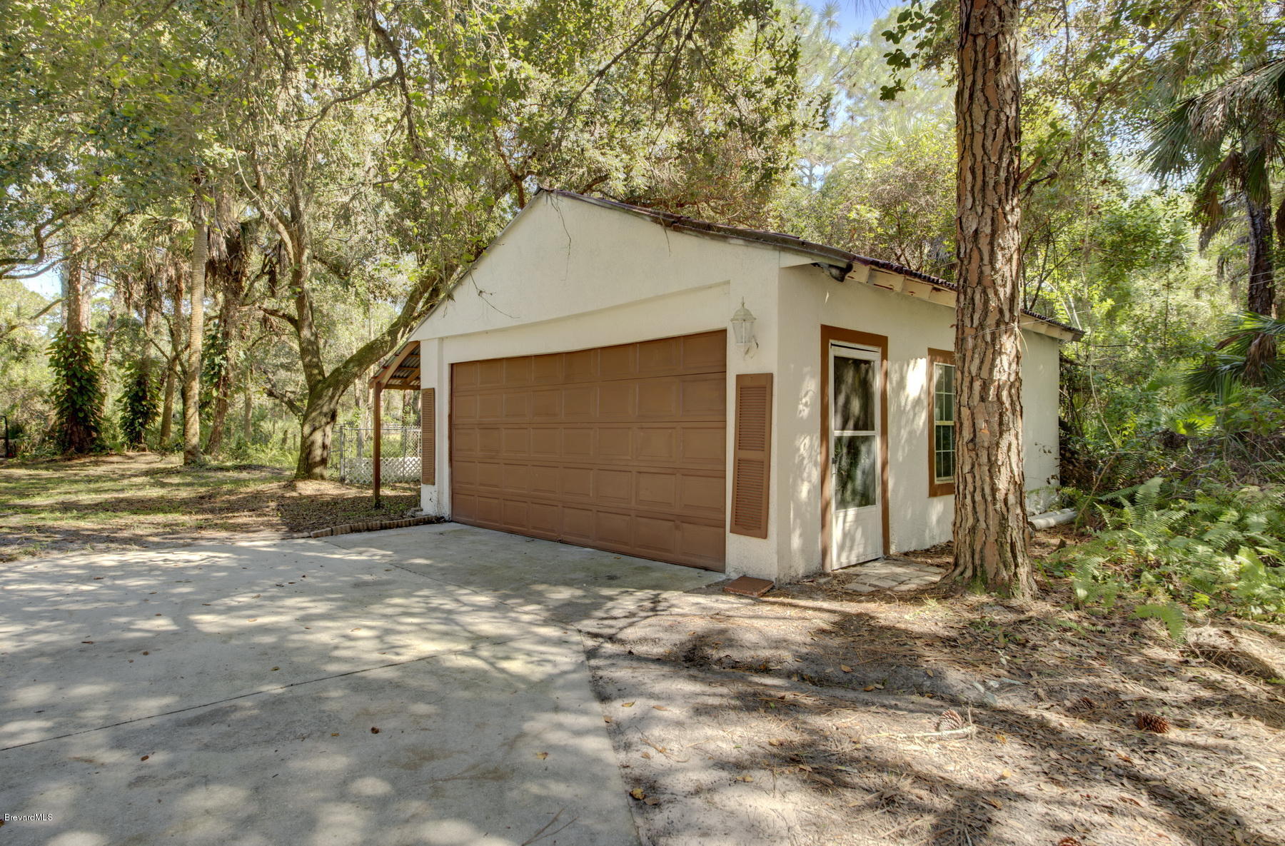 3875 Burton Road Grant Valkaria, FL 32950 - Photo 42 of 44 Two Car Garage