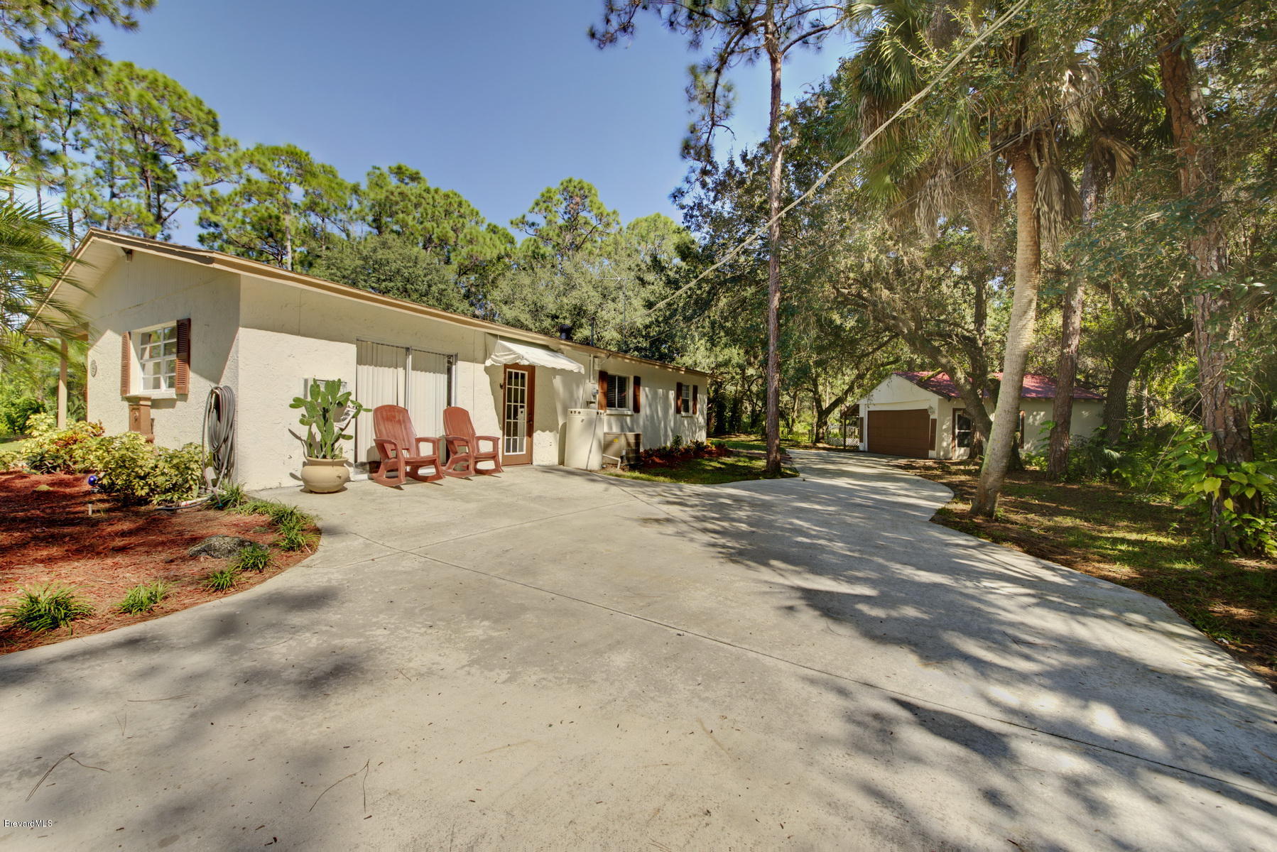 3875 Burton Road Grant Valkaria, FL 32950 - Photo 6 of 44 Driveway to Garage