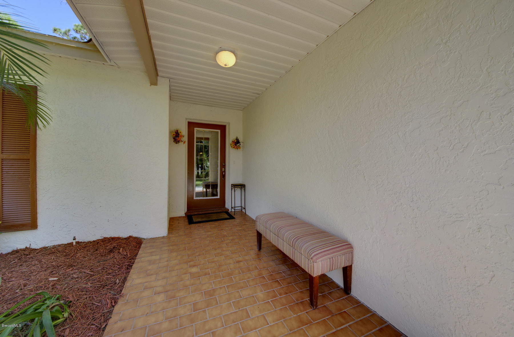 3875 Burton Road Grant Valkaria, FL 32950 - Photo 7 of 44 Covered Front Entry