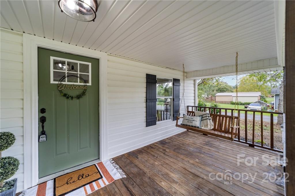 1025 Stone Road Salisbury, NC 28146 - Photo 3 of 47 a view of a porch with wooden floor and outdoor space