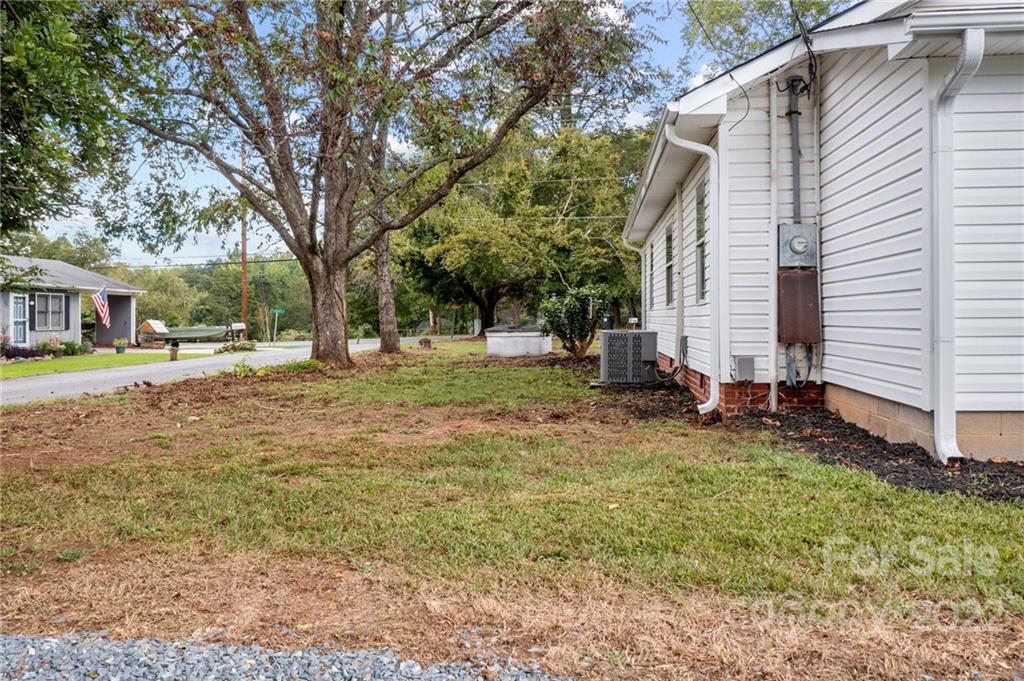 1025 Stone Road Salisbury, NC 28146 - Photo 35 of 47 a backyard of a house with yard and outdoor seating