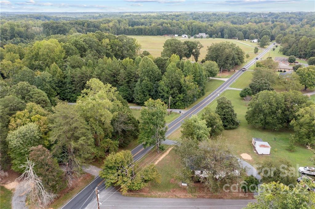 1025 Stone Road Salisbury, NC 28146 - Photo 45 of 47 a view of a forest with a lake view