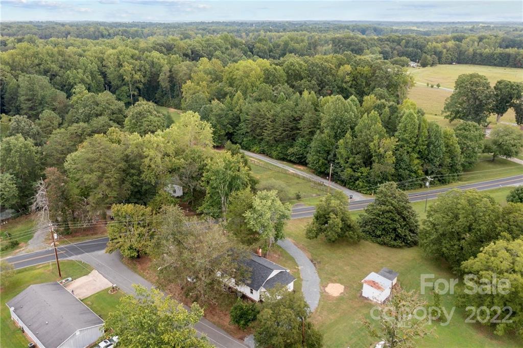 1025 Stone Road Salisbury, NC 28146 - Photo 46 of 47 a view of a green yard with large trees