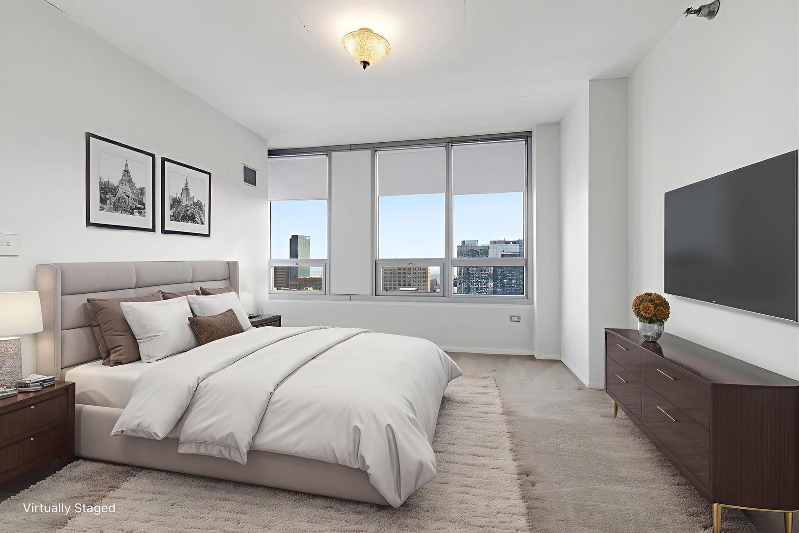 701 South Wells Street, Unit 2801 Chicago, IL 60607 - Photo 15 of 32 a bedroom with a bed and large window