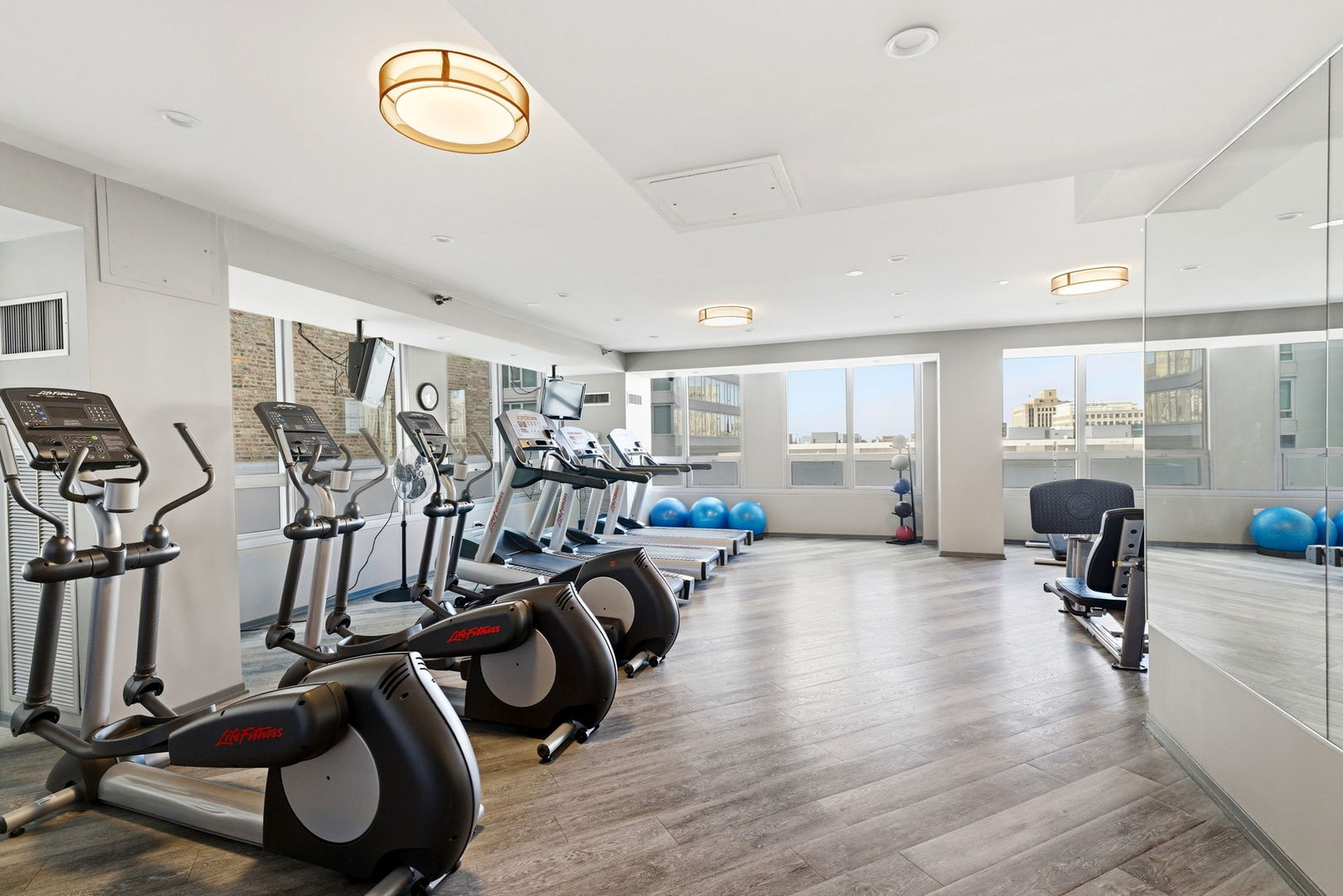 701 South Wells Street, Unit 2801 Chicago, IL 60607 - Photo 24 of 32 a view of a room with gym equipment