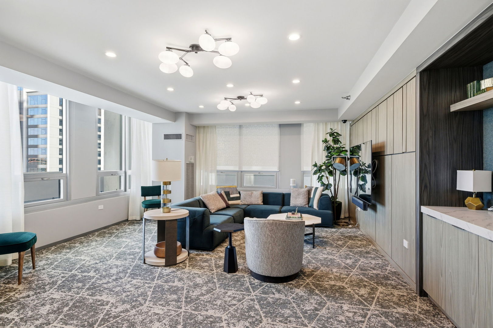 701 South Wells Street, Unit 2801 Chicago, IL 60607 - Photo 28 of 32 a living room with furniture a window and a chandelier