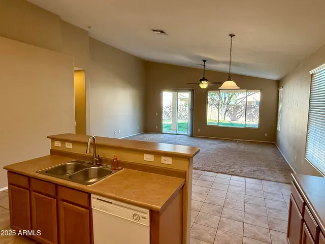 a bathroom with a sink a vanity and a mirror