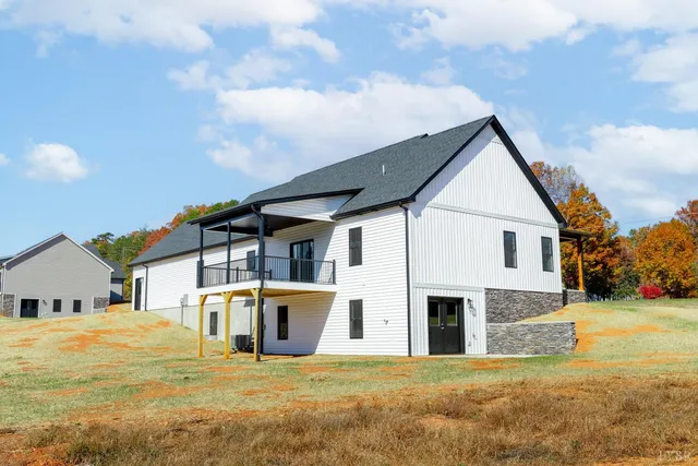 a view of swimming pool with lounge chair