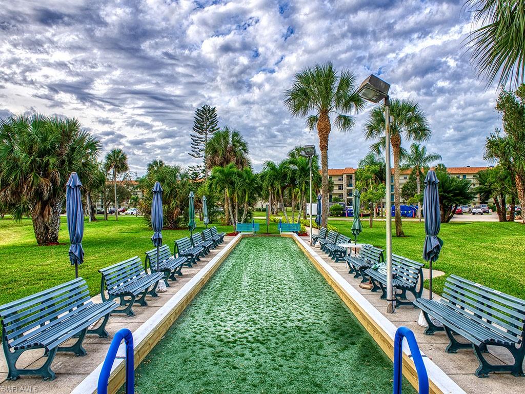 4380 27th Court Southwest, Unit 202 Naples, FL 34116 - Photo 13 of 24 a view of an outdoor space and entertaining space