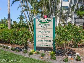 4380 27th Court Southwest, Unit 202 Naples, FL 34116 - Photo 23 of 24 a sign on the side of a road