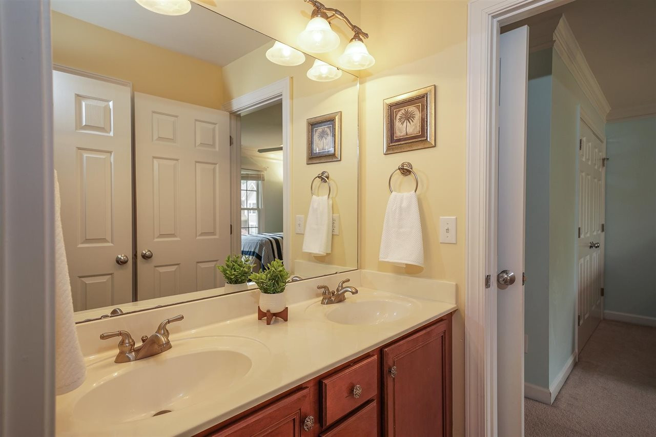 6000 Tiffield Way Wake Forest, NC 27587 - Photo 24 of 30 Jack-n-Jill bathroom with double vanities and private bathtub/toilet room. Bathroom