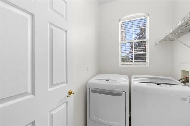 a utility room with dryer and washer