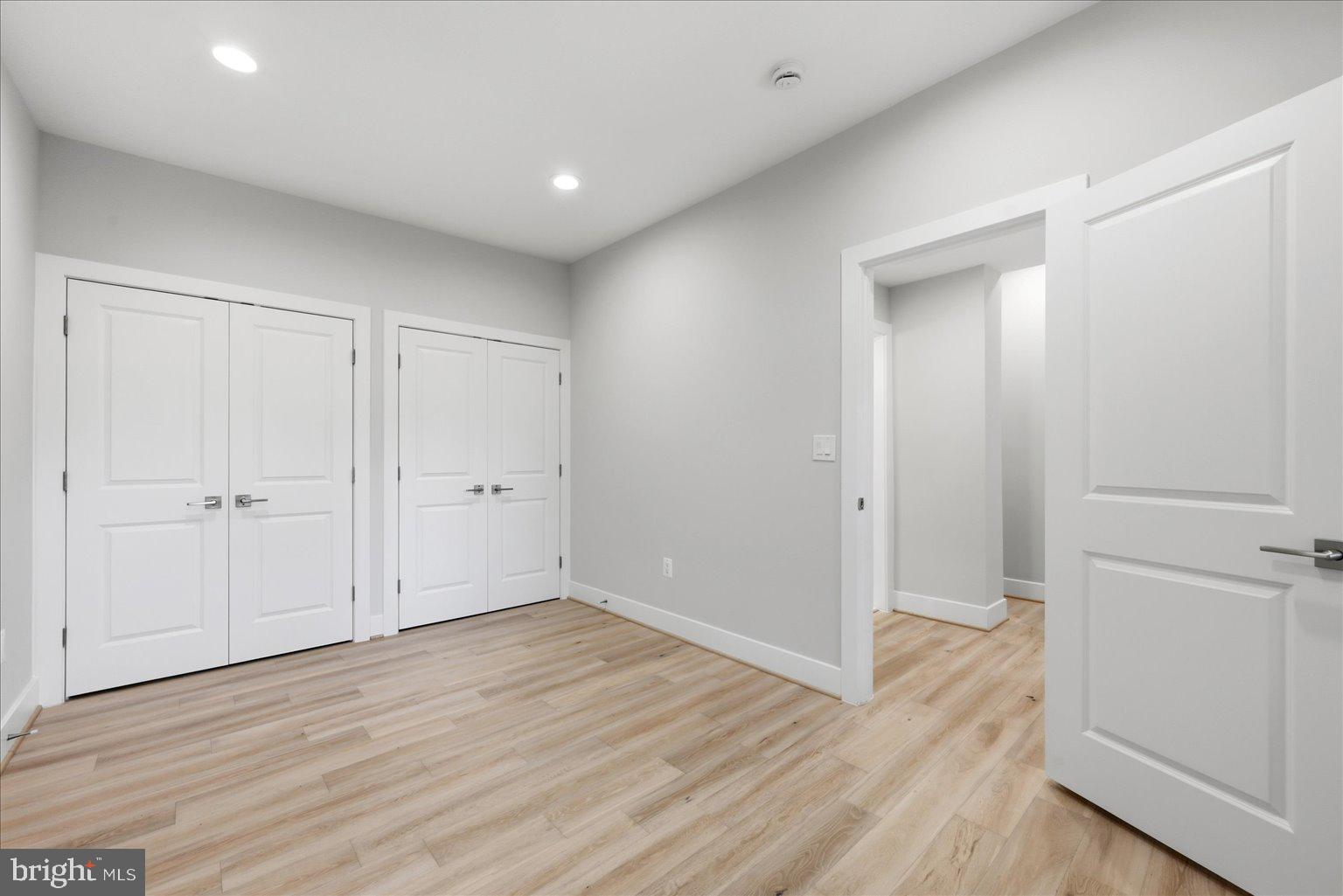 3517 Rodman Street Northwest Washington, DC 20008 - Photo 40 of 57 a view of an empty room with wooden floor