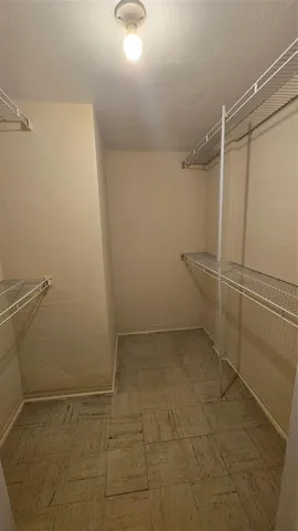 a utility room with washer and dryer
