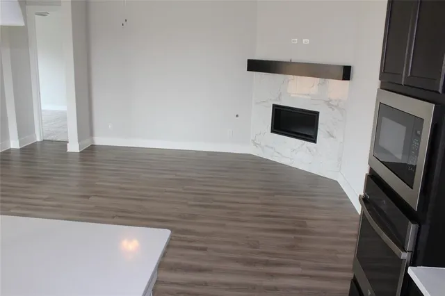 a view of a living room with a flat screen tv