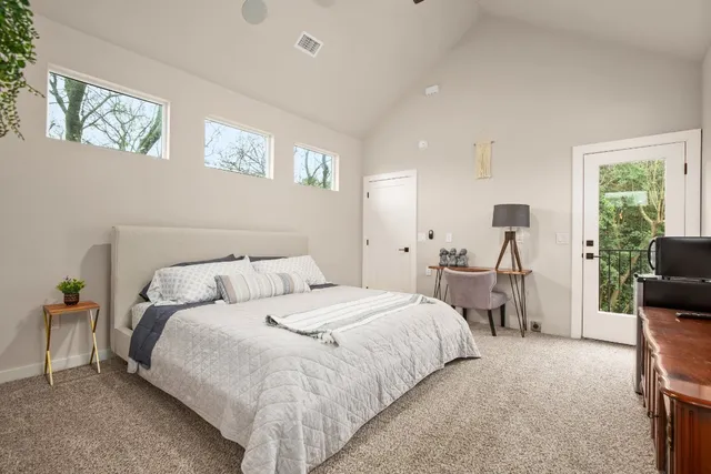 a bed room with a bed and furniture