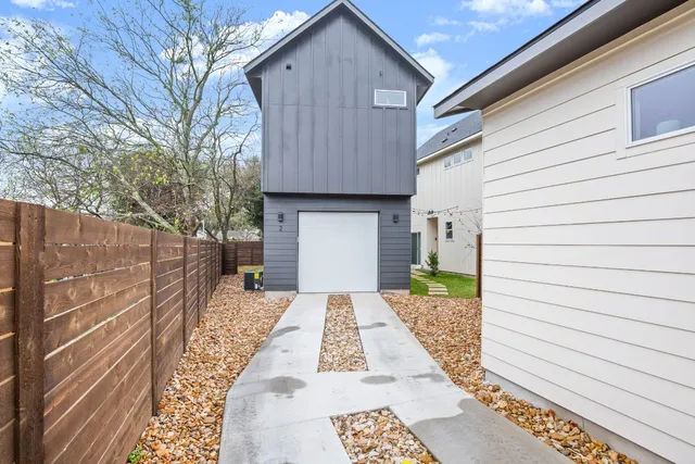 a view of a back yard of the house