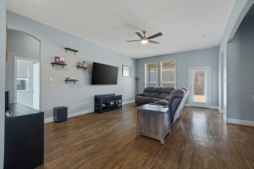 511 Ranchwood Drive Justin, TX 76247 - Photo 10 of 31 Living room with access to covered patio and back yard