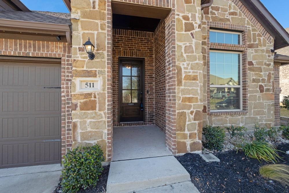 511 Ranchwood Drive Justin, TX 76247 - Photo 2 of 31 Covered front patio
