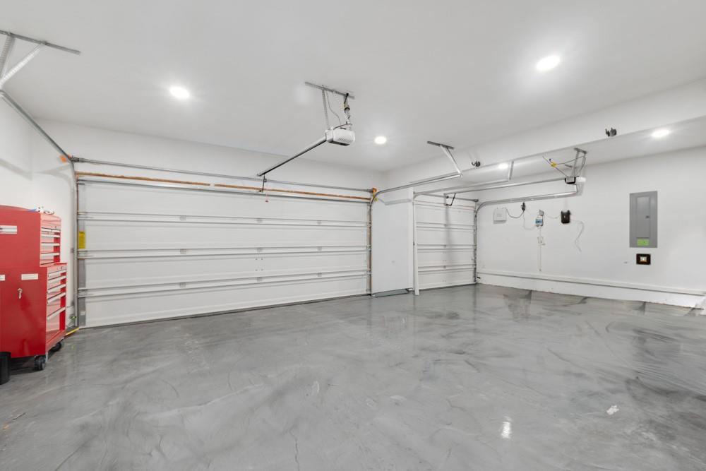511 Ranchwood Drive Justin, TX 76247 - Photo 22 of 31 3 car garage with epoxy flooring