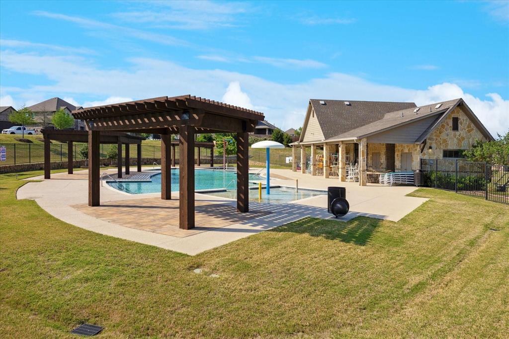 511 Ranchwood Drive Justin, TX 76247 - Photo 23 of 31 Community Pool & Clubhouse