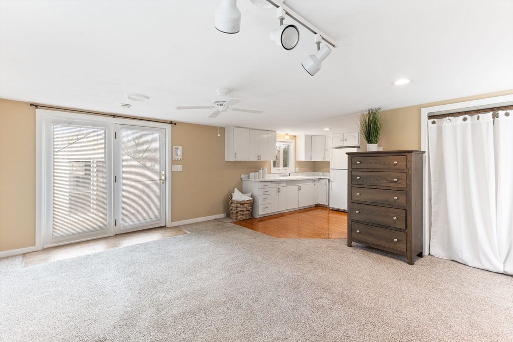 17 Weaver Street Wareham, MA 02576 - Photo 29 of 37 a view of a bedroom with cabinet closet and windows