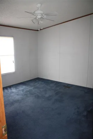 a view of a room with an empty space