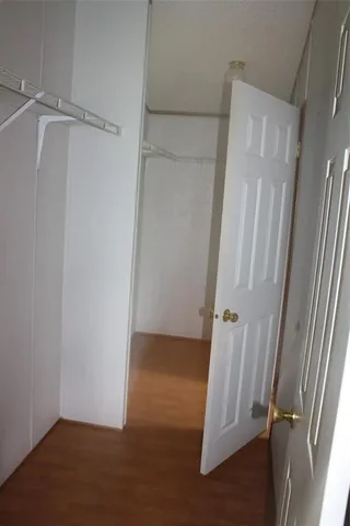 an empty room with a door