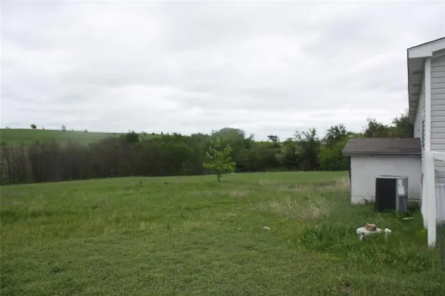 a view of an outdoor space and a yard